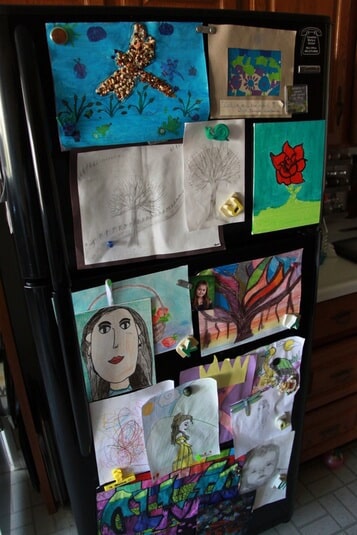 olivia's masterpieces on fridge