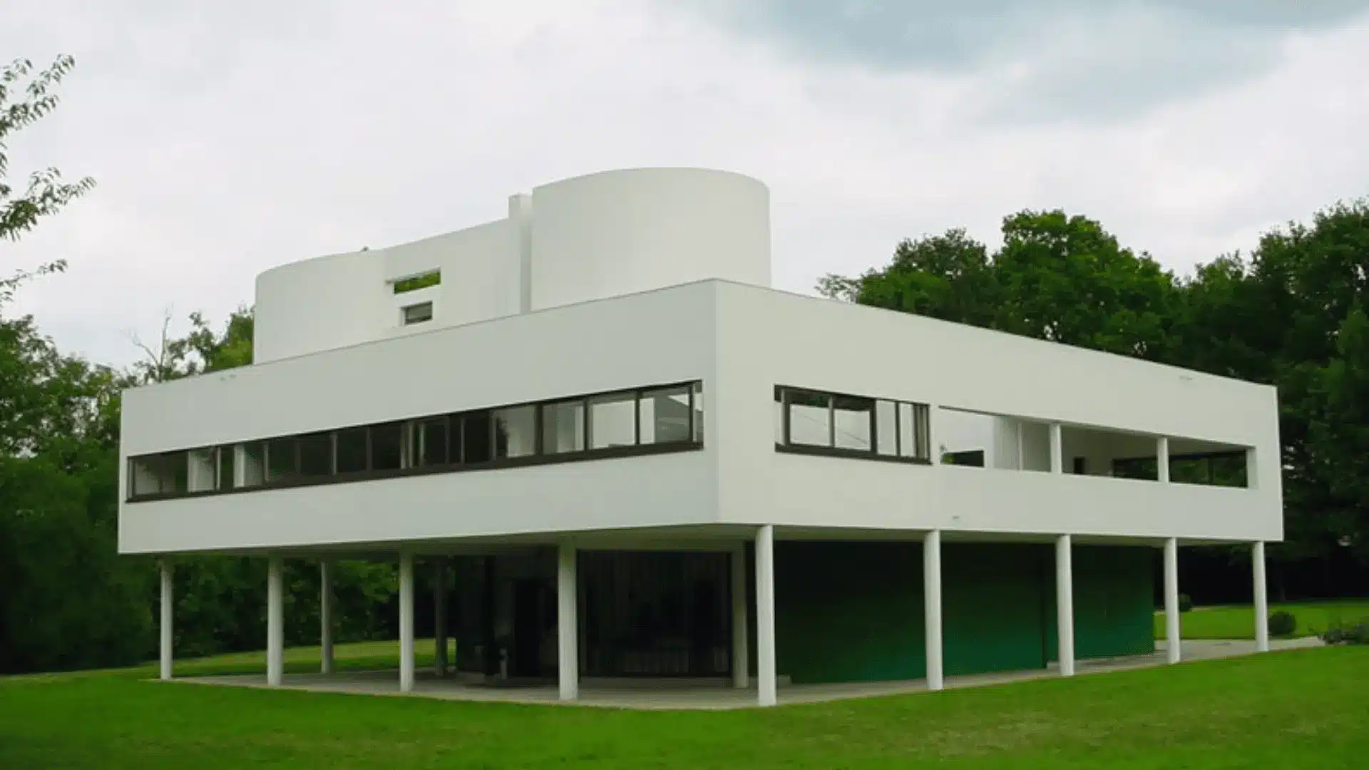 Villa Savoye by Le Corbusier, an iconic example of European modern architecture featuring a minimalist design.