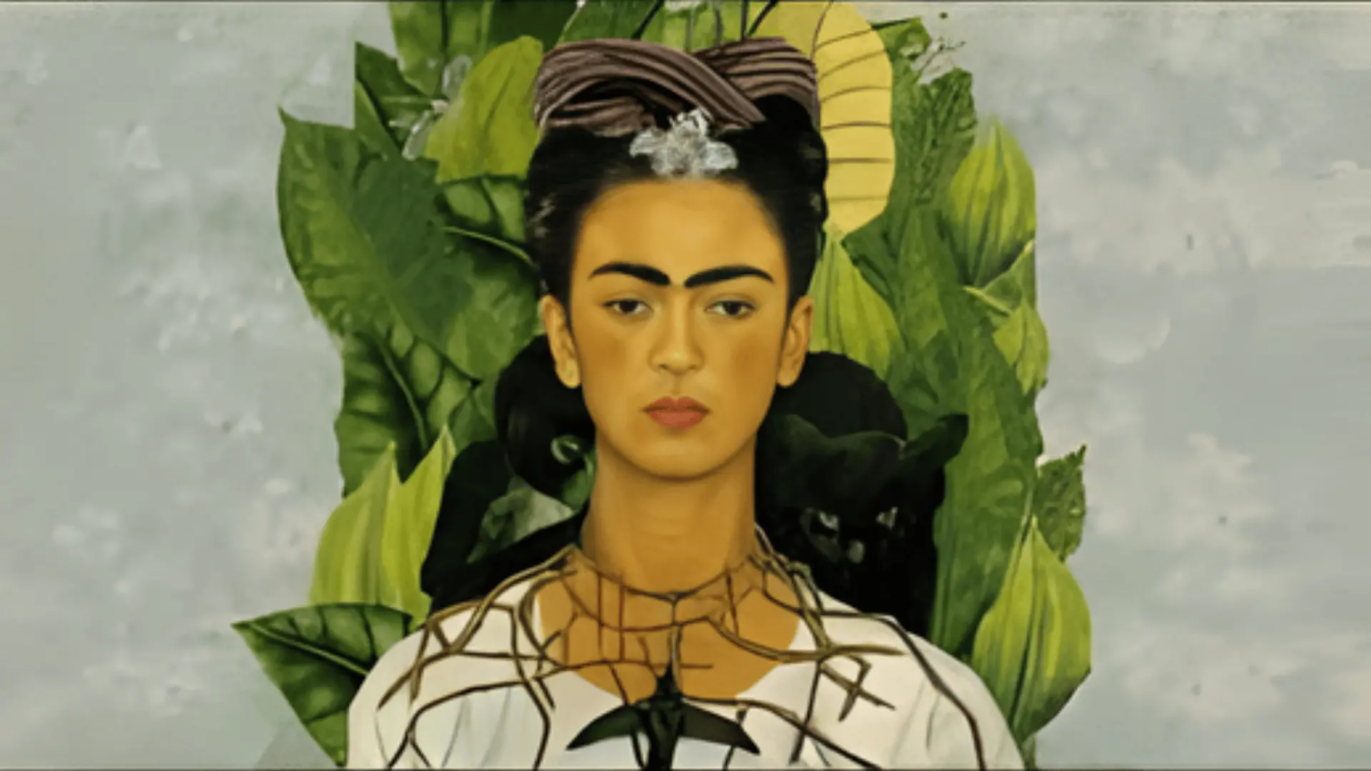 Frida Kahlo’s self-portrait features a thorn necklace, a hummingbird, and a black cat, symbolizing pain, hope, and bad luck.