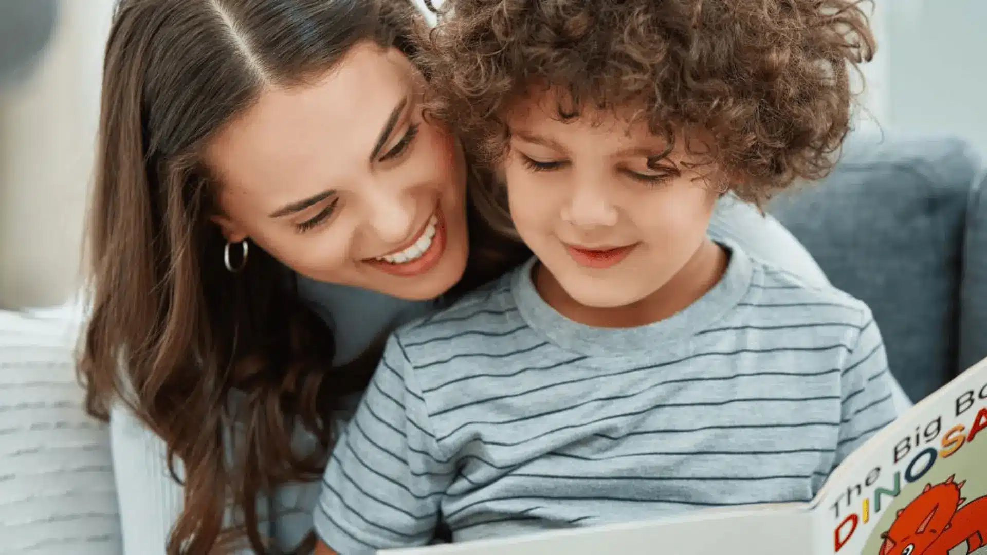 a mother reading with her child 