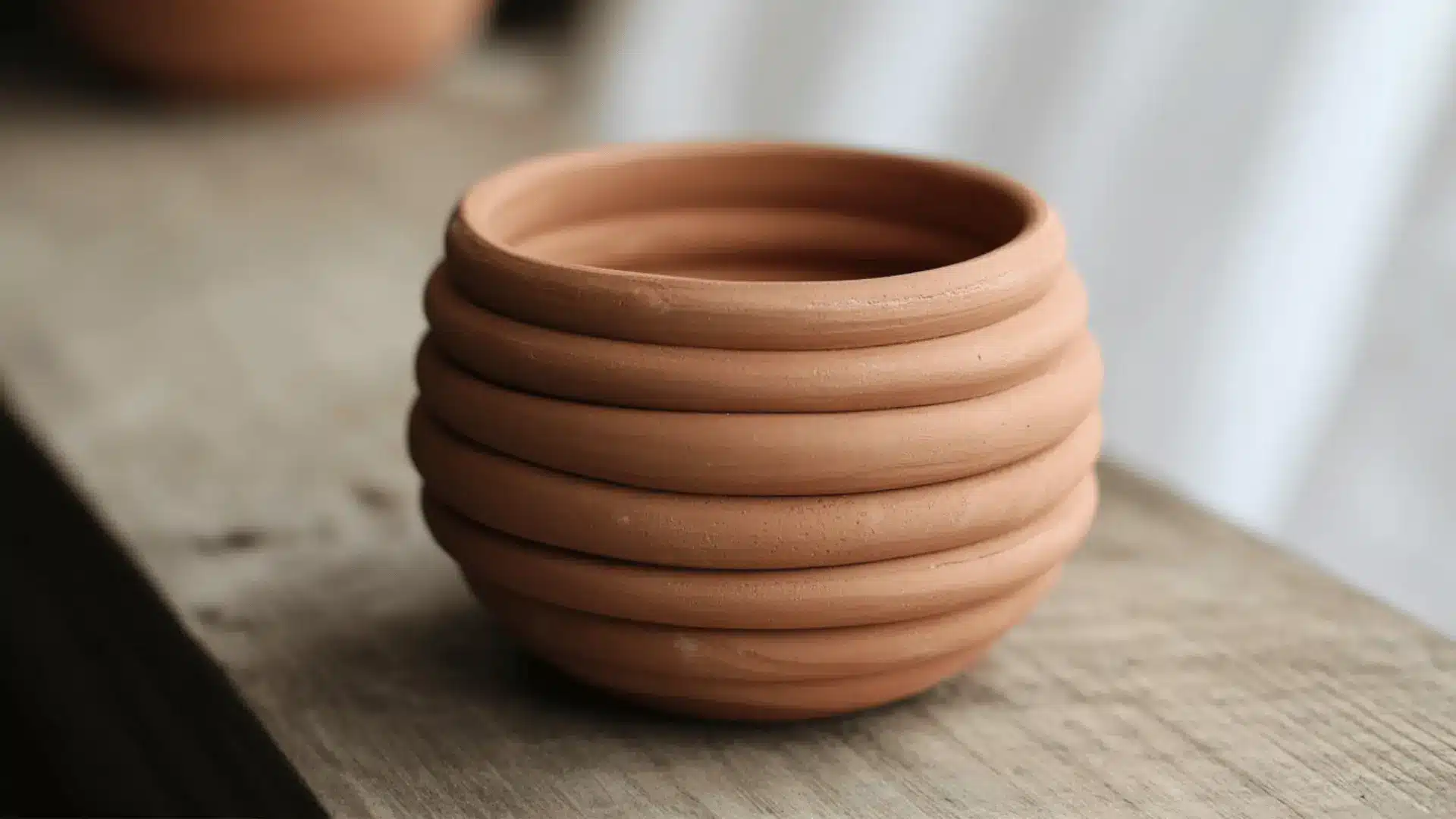 a pot made with layered coiling 