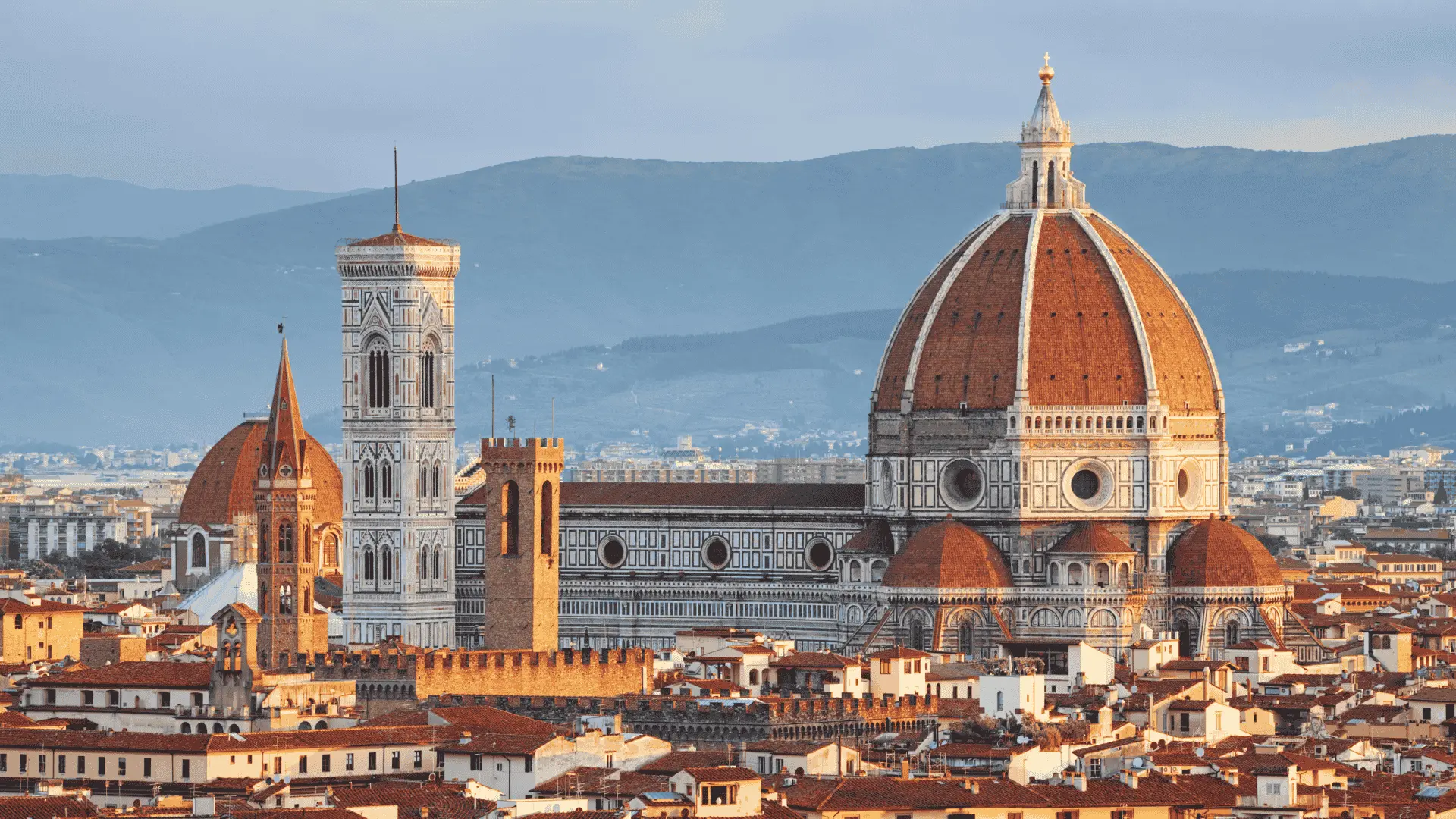 A scenic depiction of Florence, Italy, highlighting its famous Renaissance buildings and picturesque streets
