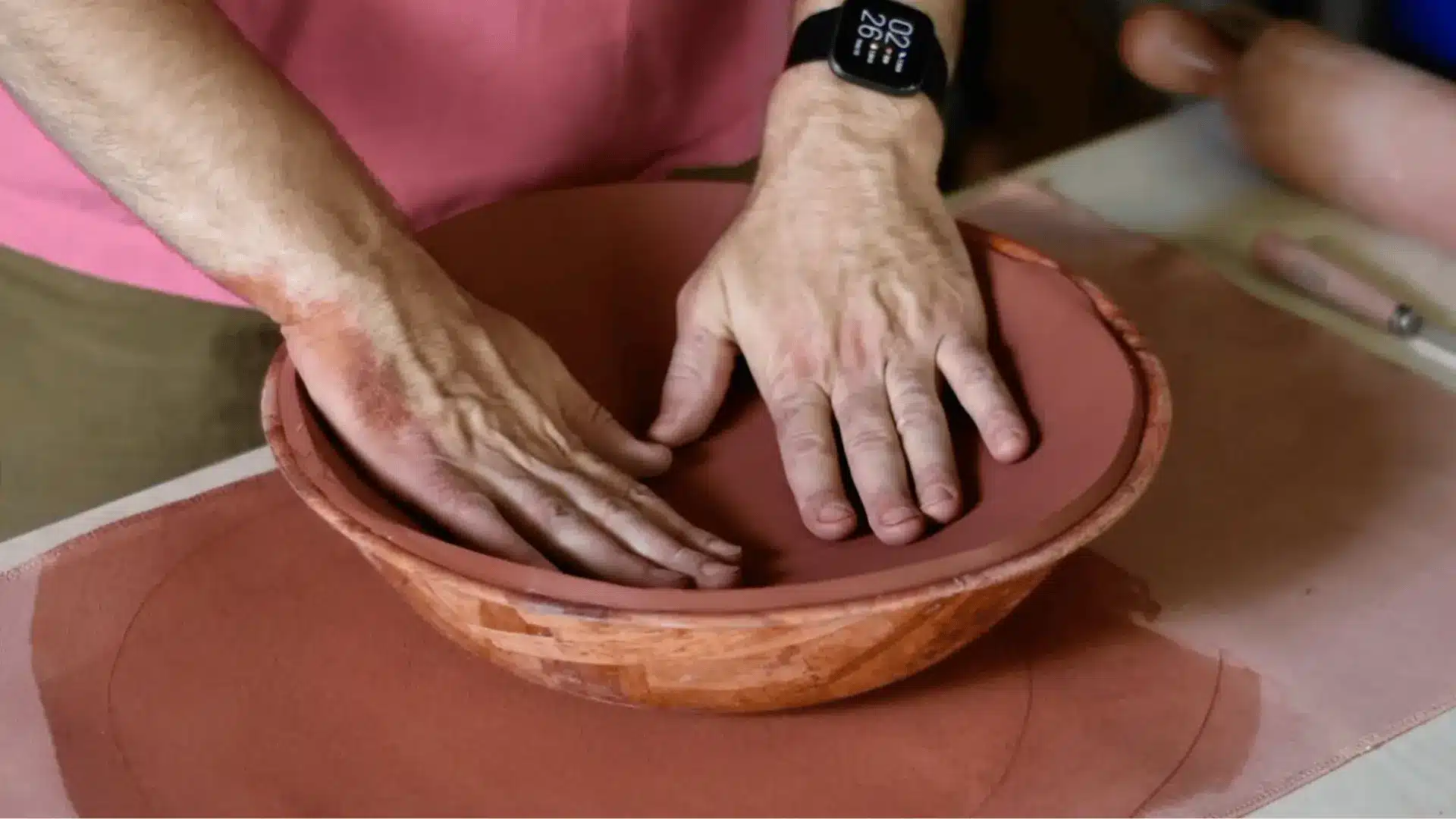a person using the slump molding technique 