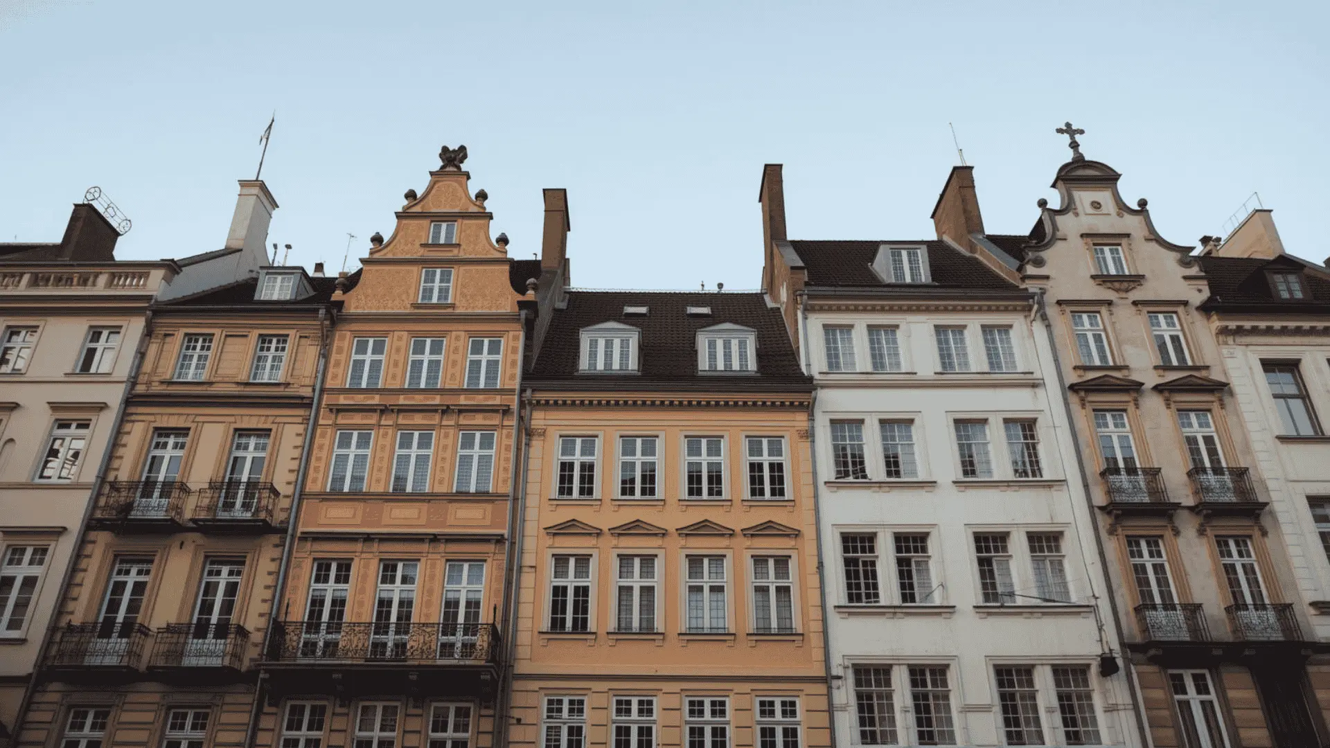 A row of European buildings showcasing diverse architectural styles and historical significance