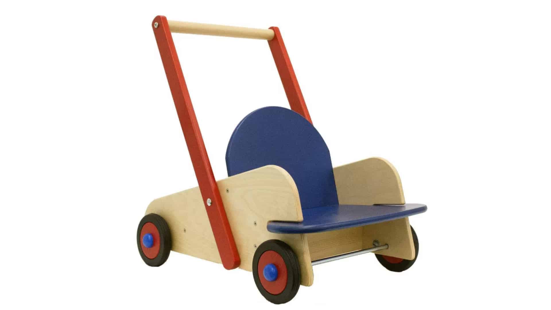 HABA wooden walker wagon with blue seat, natural wood body, red handlebars, and rubber wheels, on a white background