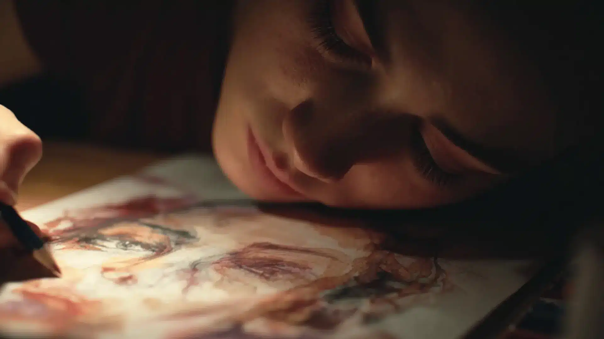 a teen softly drawing an abstract memory with watercolor