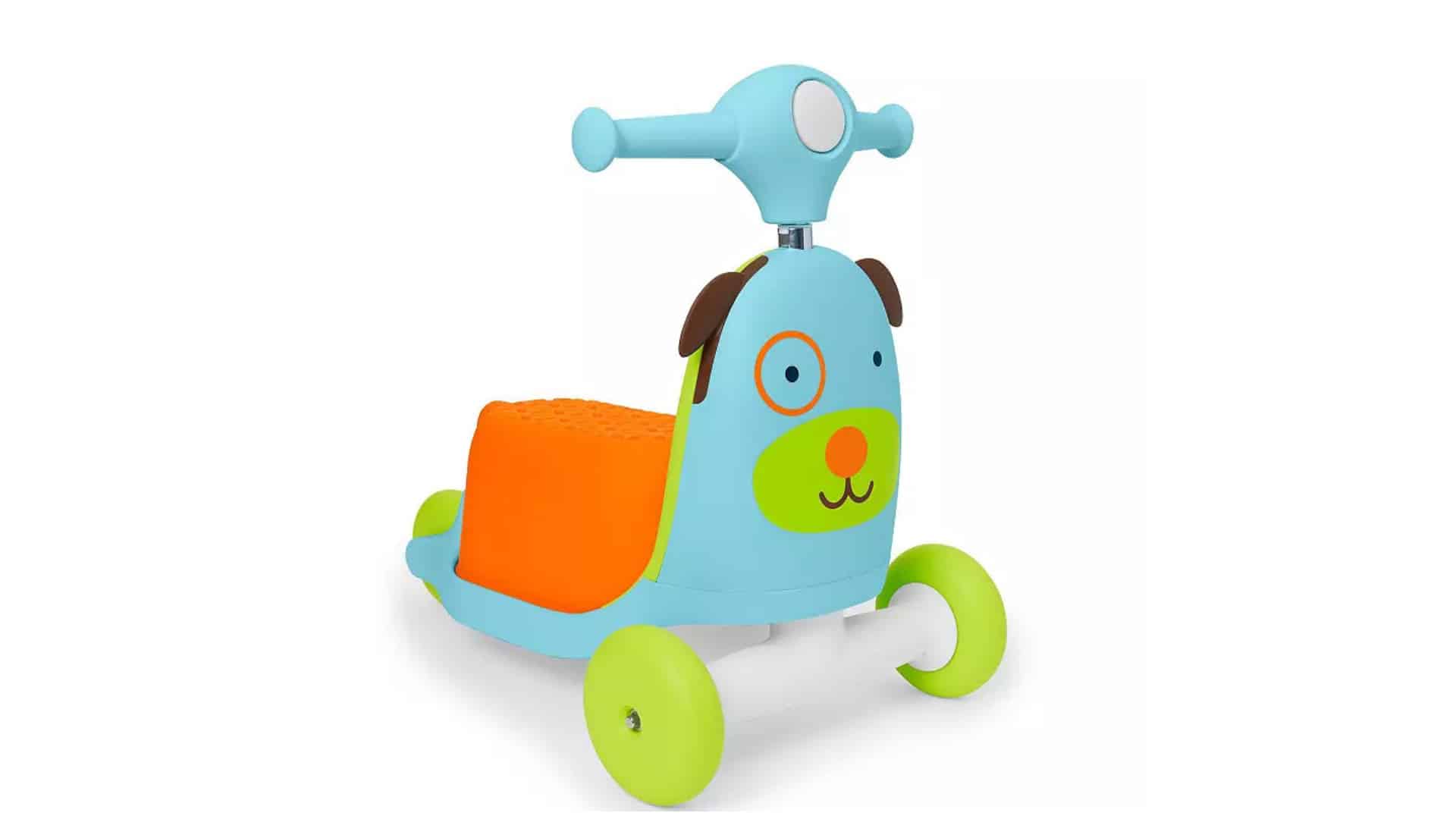Blue ride on and push toy with orange seat and green wheels, styled as a simple product shot on white background