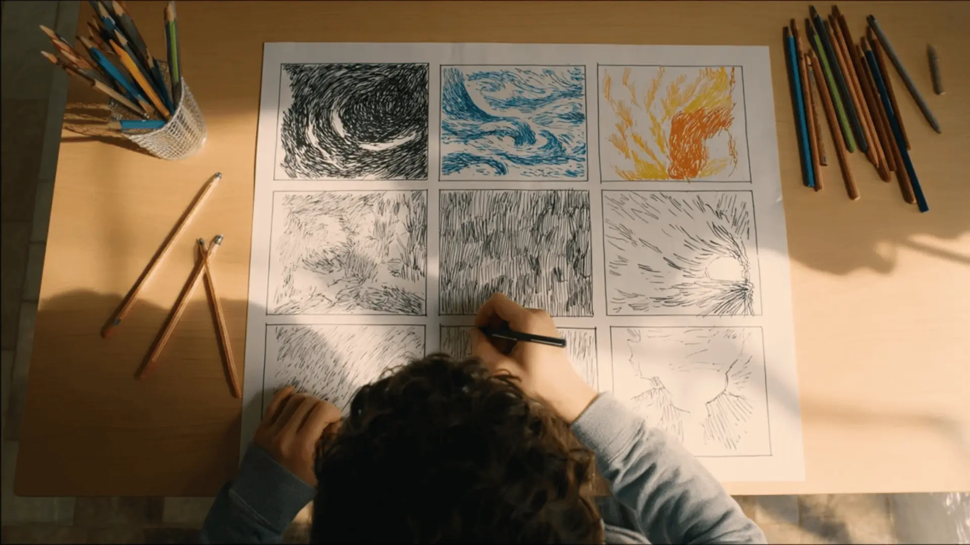 overhead storyboard page showing simple emotion-focused drawings