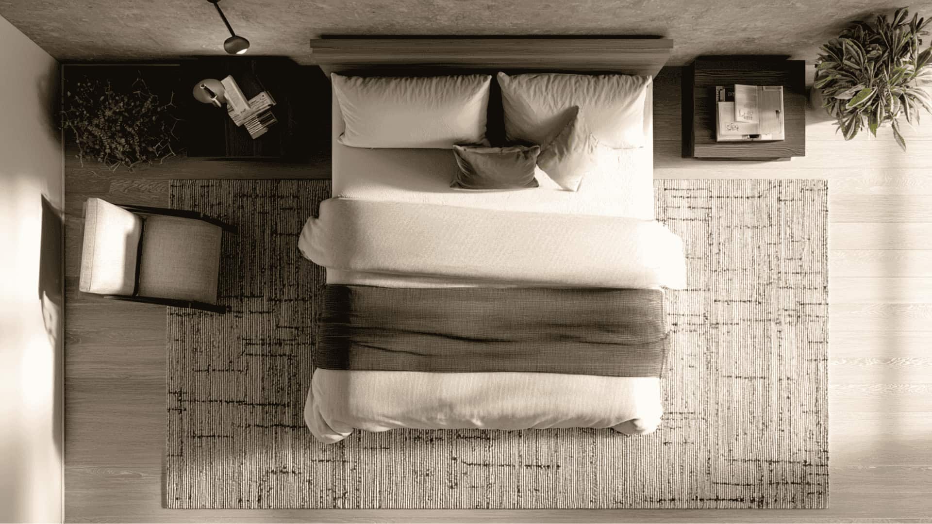  8'x10' rug under the lower two-thirds of the king bed with nightstands off the rug in a medium bedroom