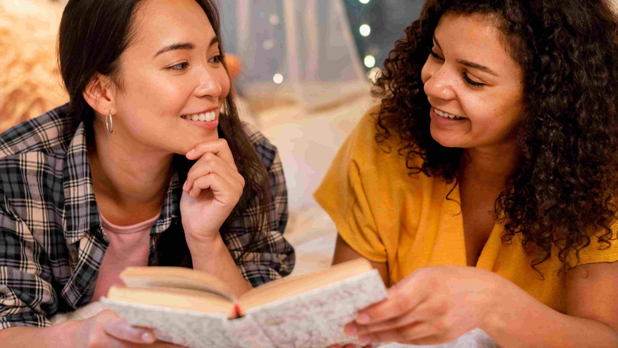Person writing a personal story in a notebook for a community mental health campaign