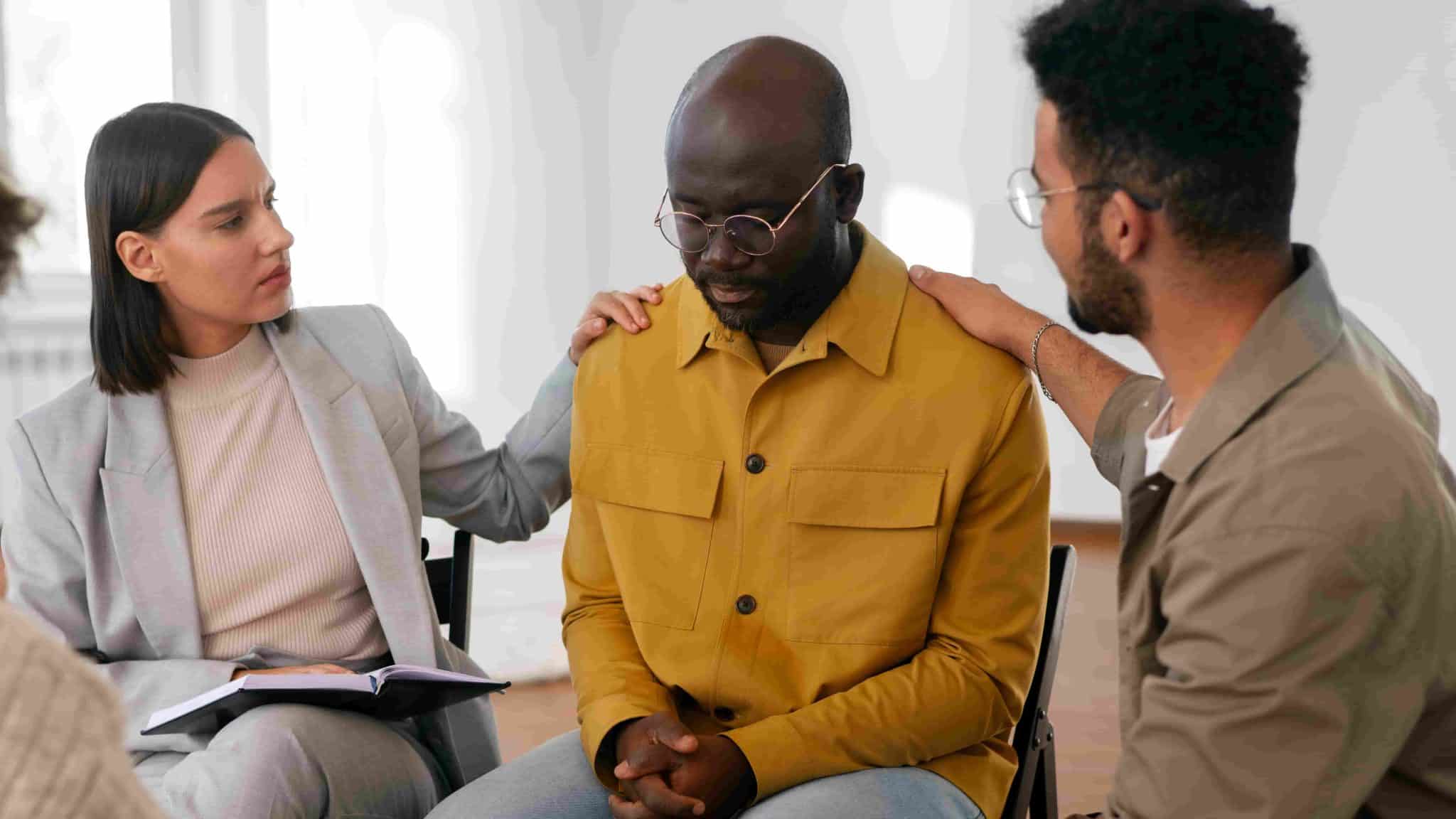 Students sitting in a circle during a peer support discussion in a classroom